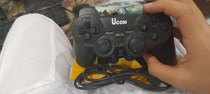 gamepad branded  gaming controller  Ucom company 4