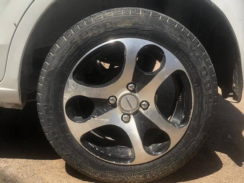 alloy rims+ tyres 14 inch for sell new just 3 months used 1