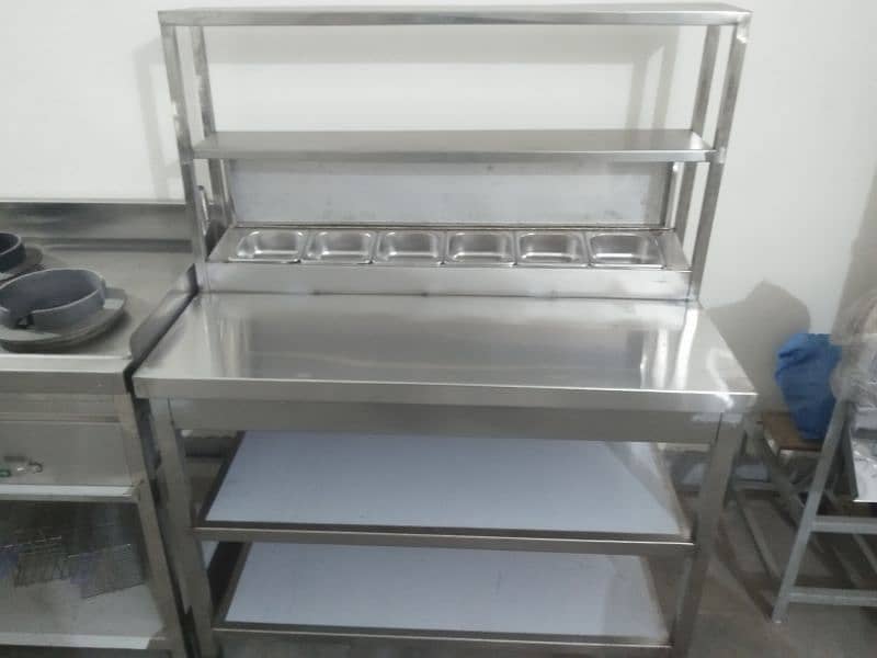 prep table 2x4 stainless Steel with 6 containers and gentry 1