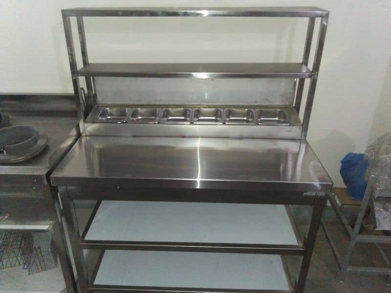 prep table 2x4 stainless Steel with 6 containers and gentry 8