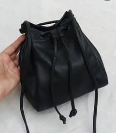 black bucket bag
