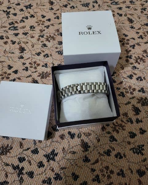Rolex (silver) 1