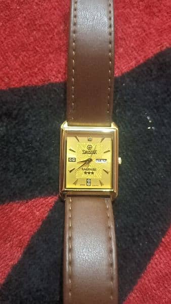 SWISTAR analog watch original old is gold 1