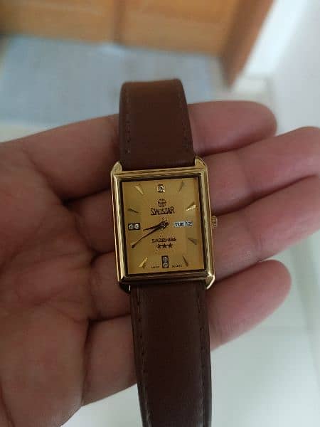 SWISTAR analog watch original old is gold 8