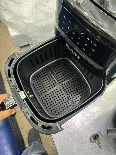 Original Philips Air Fryer Fry. Bake. Grill. Roast. And even reheat 1