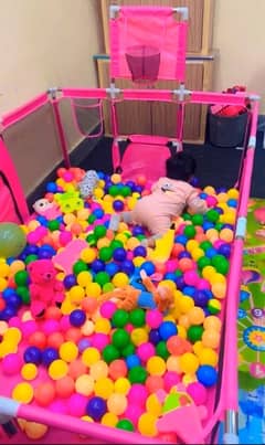 kids play area with balls & soft toys