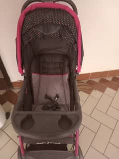 branded stroller, with its orignal carry cot and car seat
