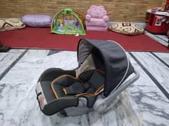car seat+ baby rocker+ carry cot