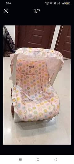 Comfort carry cot, chair with rocke. .