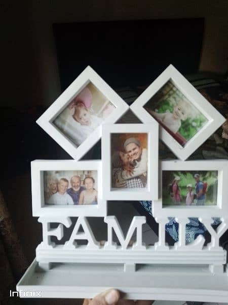 a wall hanging photo frame 1