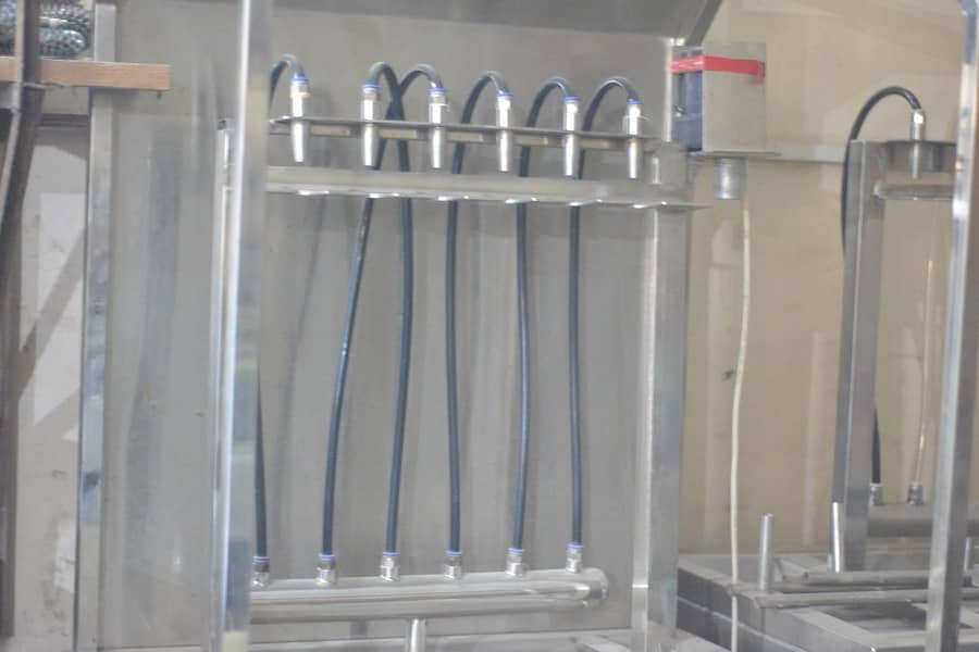 water filling machine sealer and heat dryers and shrink tunnel 3