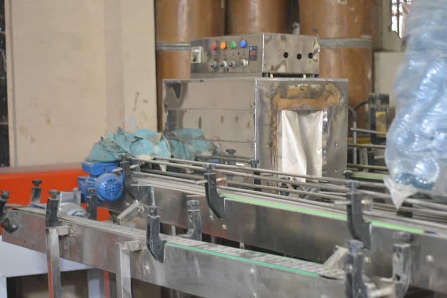water filling machine sealer and heat dryers and shrink tunnel 2