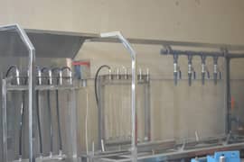 water filling machine sealer and heat dryers and shrink tunnel
