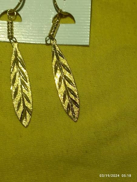 leaf shape golden colour ear rings 11