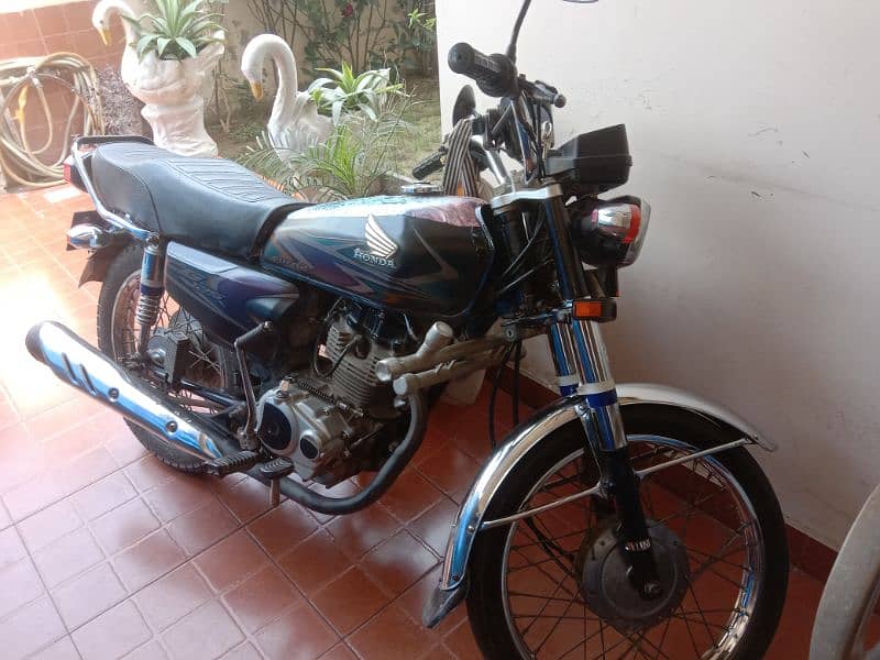 Honda 125 and United Motors B z u Colony 0