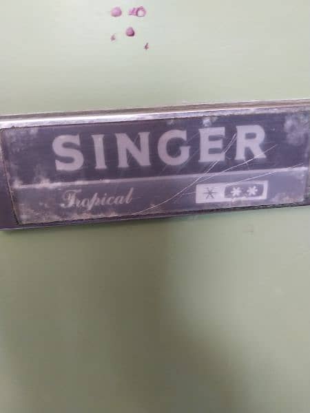 singer fridge  . medium size refrigerator.  fidge for sale 5