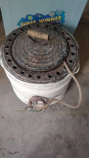 Gas tandoor available due to house shifting. . . 1