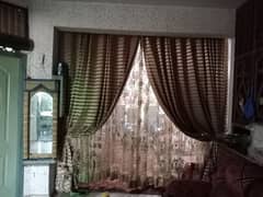 used but in good condition double curtain one plain and attached net c