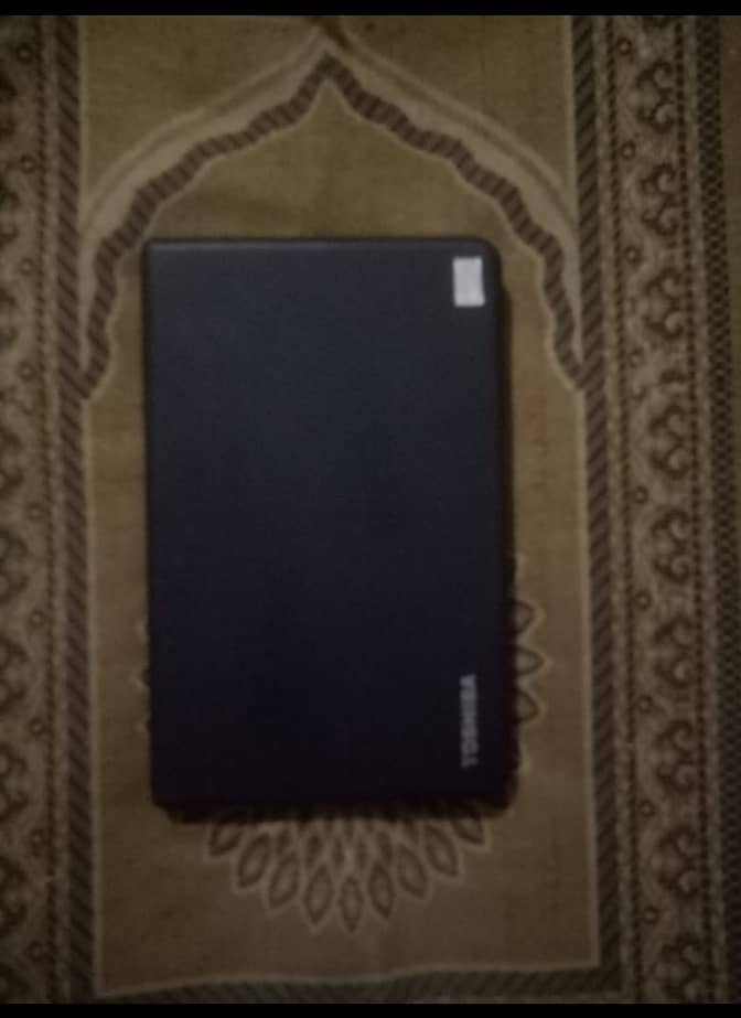 Toshiba laptop with charger condition 10/9 ha 1