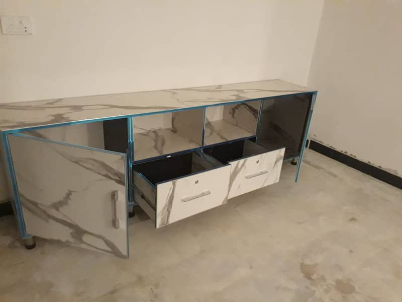 TV unit 8fit lenght, 2.5 hight, depth 18inches 1