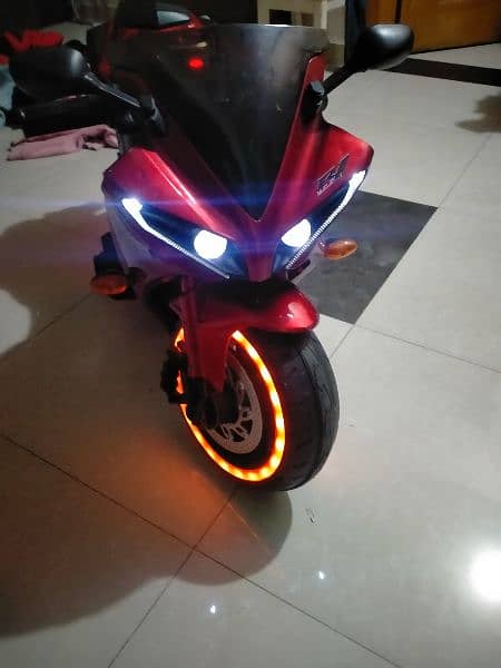 Kids electric bike. Tyer light + USB port for song. new condition 1