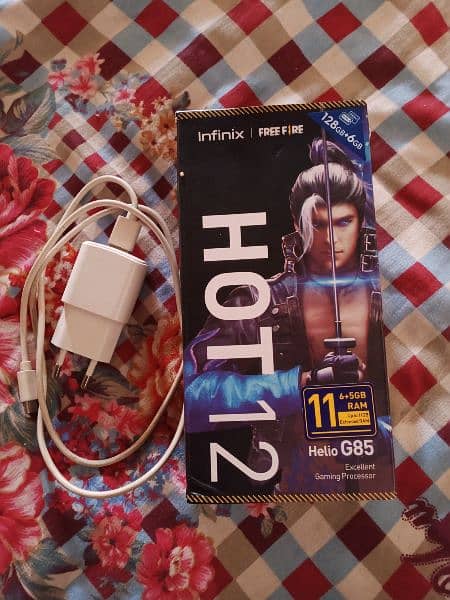 Infinix hot 12 6/128GB full 10 by 10 condition with box charger 7