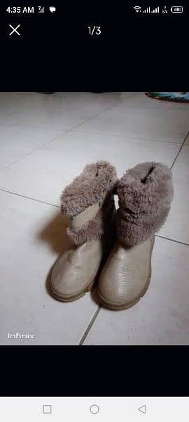 a long fur shoes of age six to seven year 2