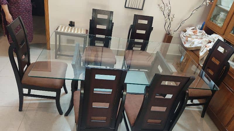 Wooden dining table with glass top 3
