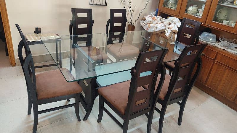 Wooden dining table with glass top 4
