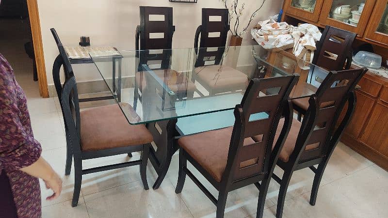 Wooden dining table with glass top 5