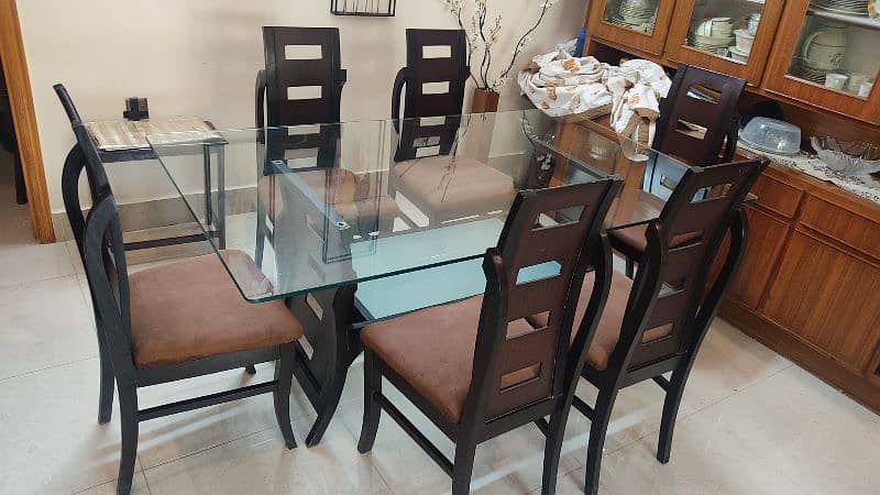 Wooden dining table with glass top 6