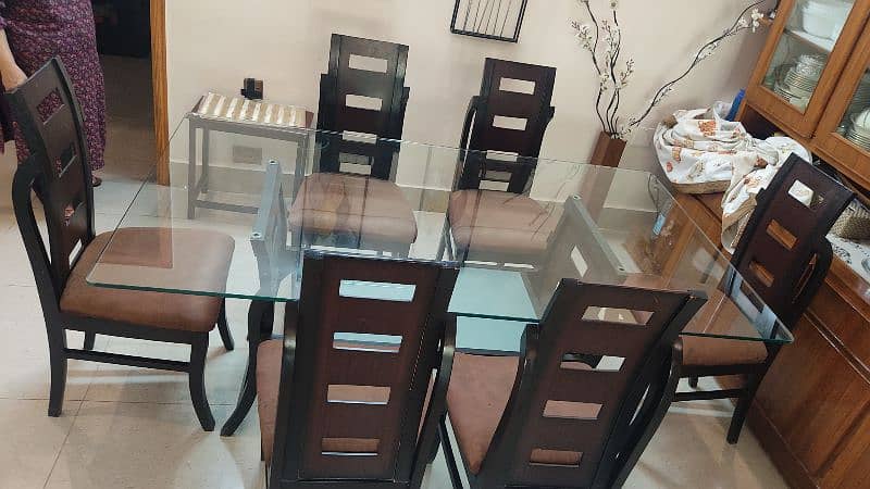 Wooden dining table with glass top 7