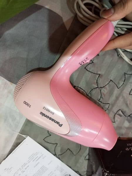 Panasonic hair dryer with 10 months brand Warenty. 3