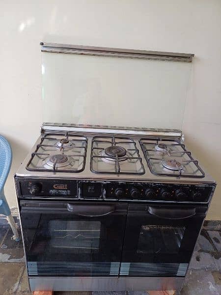 Cooking stove with 5 Burners , Oven and Top glass cover 5