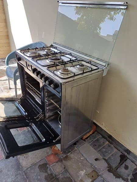 Cooking stove with 5 Burners , Oven and Top glass cover 6
