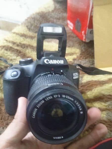 Canon 4000 D with 2 batteries charger and  11-55 lens with box 1