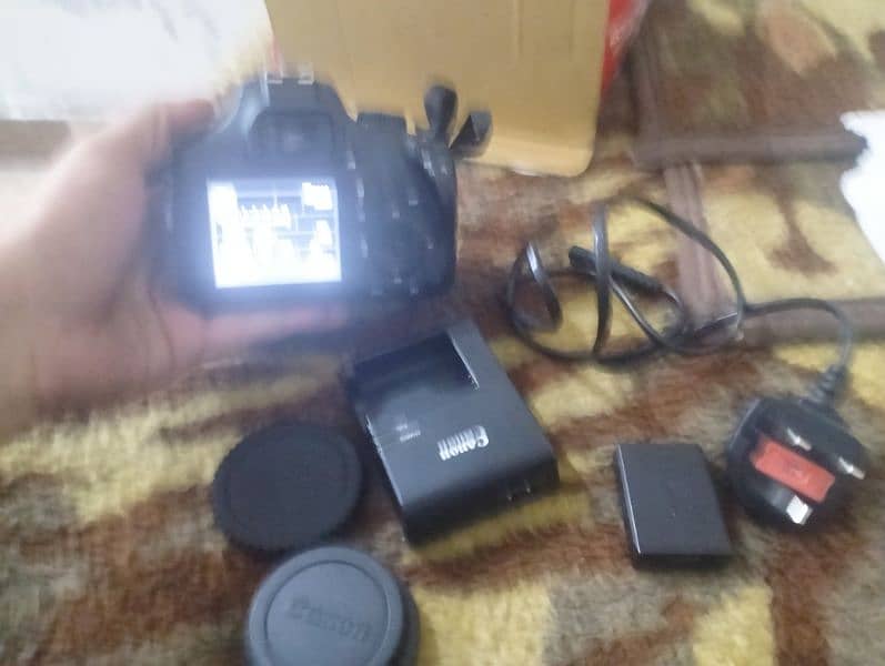 Canon 4000 D with 2 batteries charger and  11-55 lens with box 6
