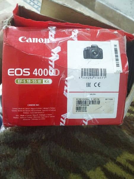 Canon 4000 D with 2 batteries charger and  11-55 lens with box 10