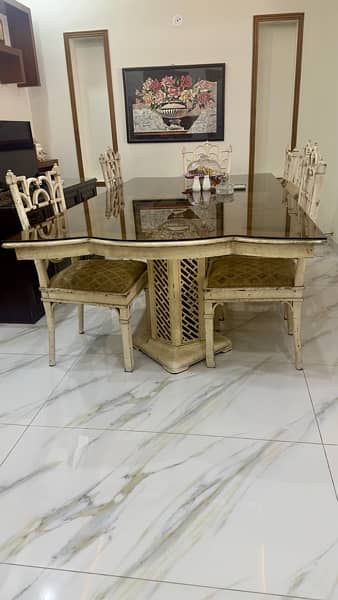 Interwood used Dining Table with 6 chairs and glass top 1