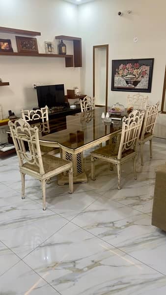 Interwood used Dining Table with 6 chairs and glass top 2