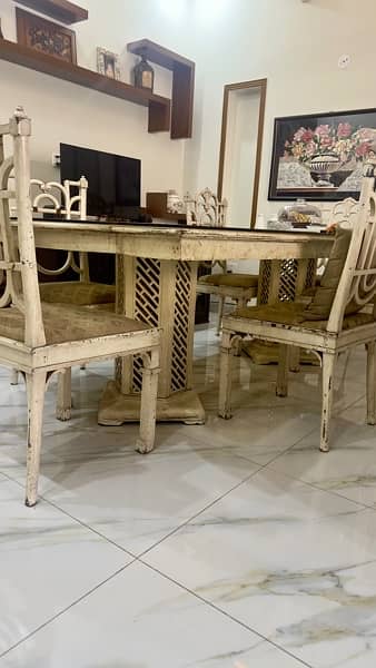 Interwood used Dining Table with 6 chairs and glass top 3