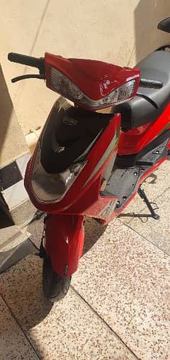 RED COLOUR ELECTRIC SCOOTY