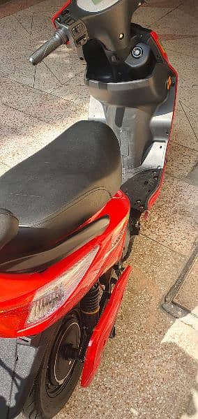 RED COLOUR ELECTRIC SCOOTY 2