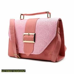stylish hand bag with top handle and long strap