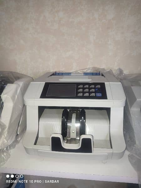 cash packet currency fake note detector bill counting machine Pakistan 18