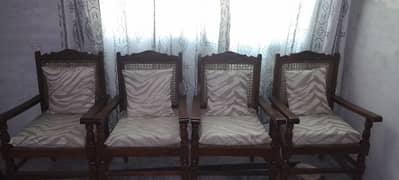 four  wood chairs