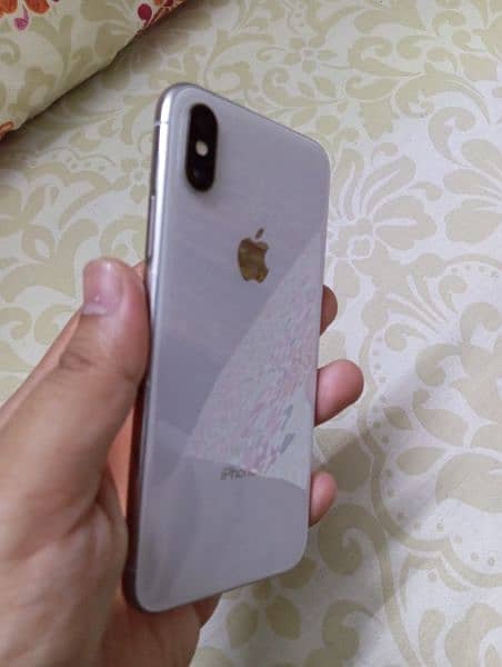selling iPhone X 64 GB PTA approved face id and true tone enabled 10