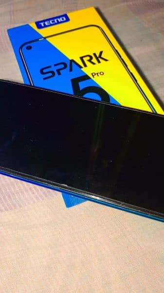 tecno spark 5pro with black back cover 4