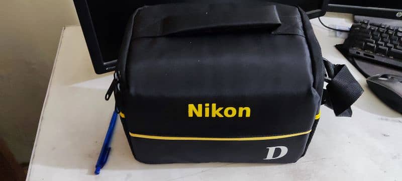 Nikon D5200 dslr with 2 lenses and bag strap 2