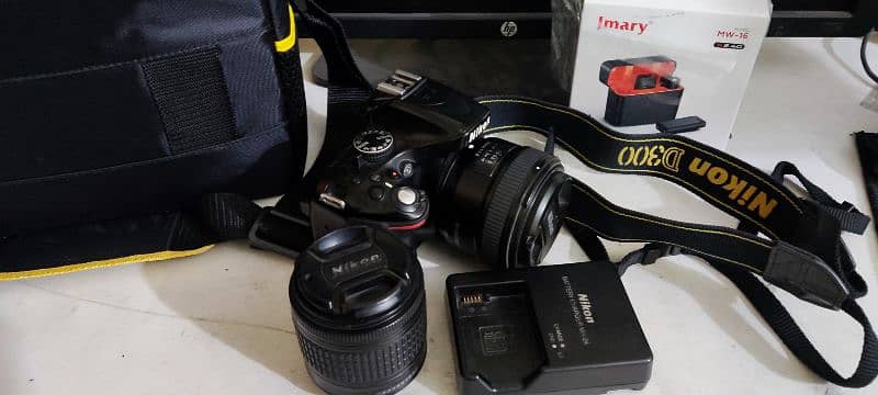 Nikon D5200 dslr with 2 lenses and bag strap 3